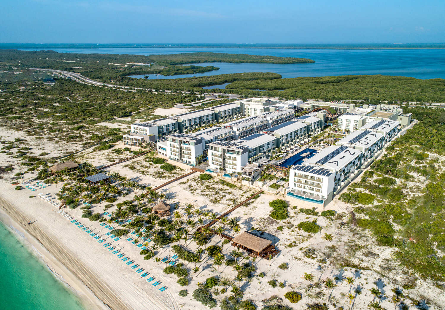 Catalonia Grand Costa Mujeres all-inclusive beachfront resort with pools and modern accommodations near Cancun, Mexico.