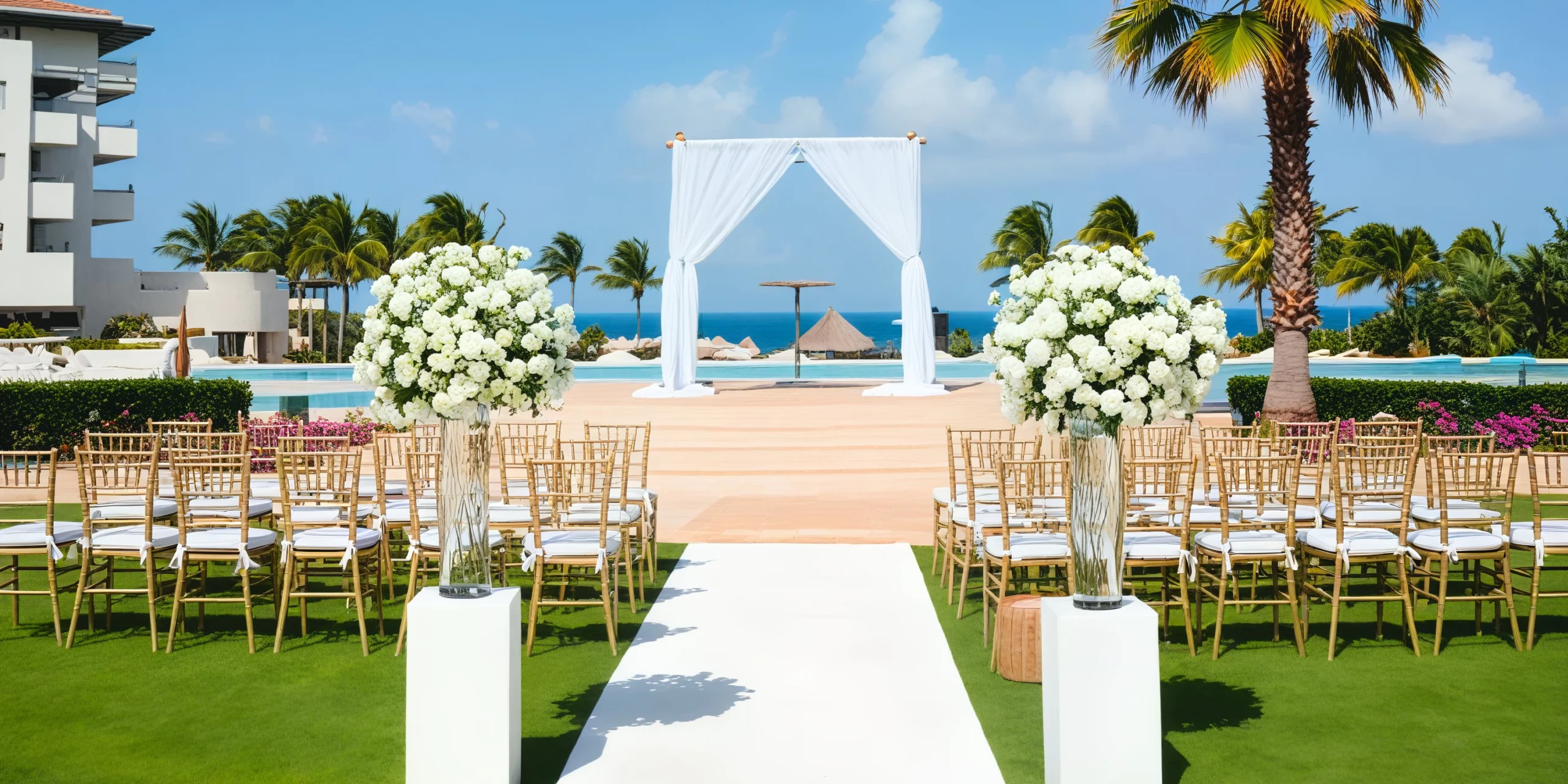 Central garden wedding venue setup with lush greenery and elegant seating at Dreams Playa Mujeres Golf & Spa Resort