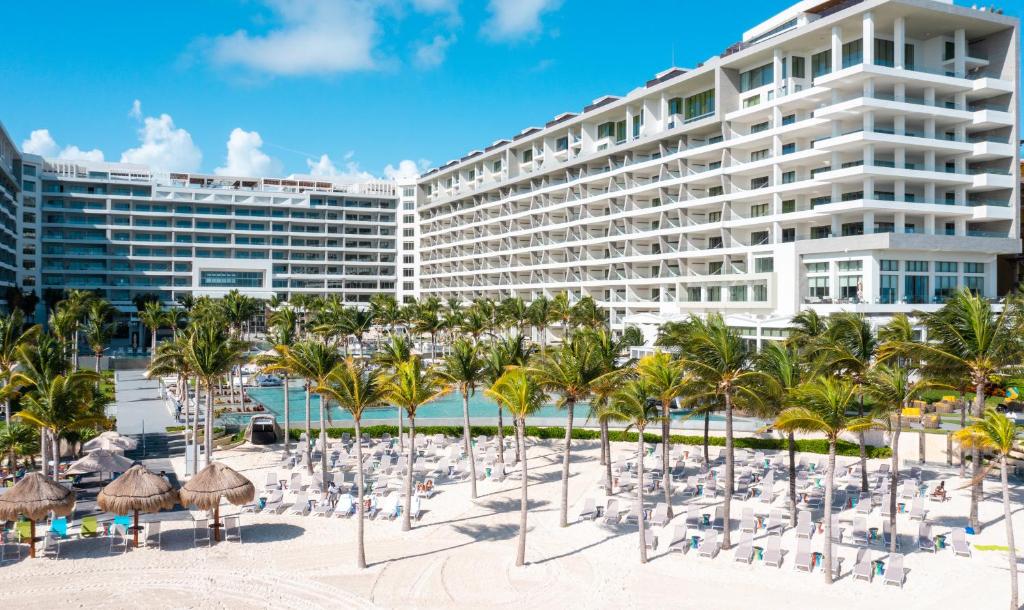 Garza Blanca Resort and Spa Cancun luxury beachfront resort with modern suites and ocean-view infinity pools.
