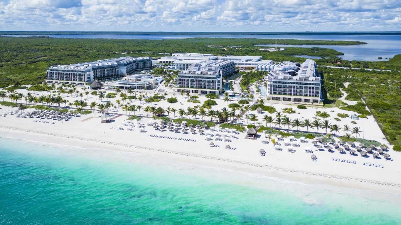 Majestic Elegance Costa Mujeres all-inclusive beachfront resort with modern suites and ocean-view pools near Cancun.
