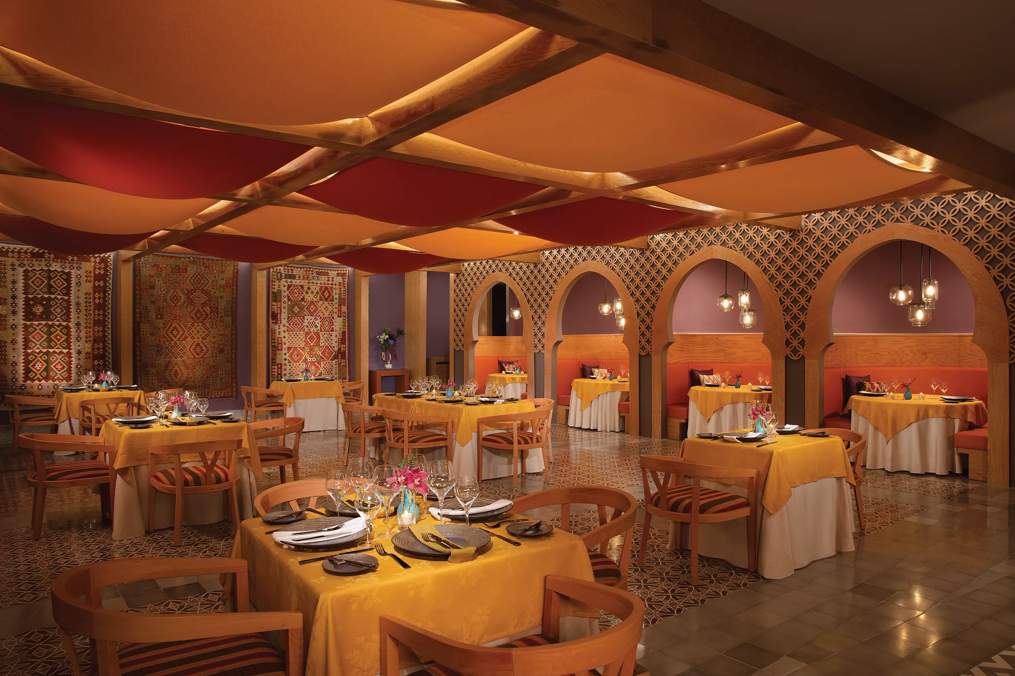 Mezés Mediterranean restaurant at Dreams Playa Mujeres Golf & Spa Resort featuring a modern dining space with shared plates and coastal-inspired ambiance.
