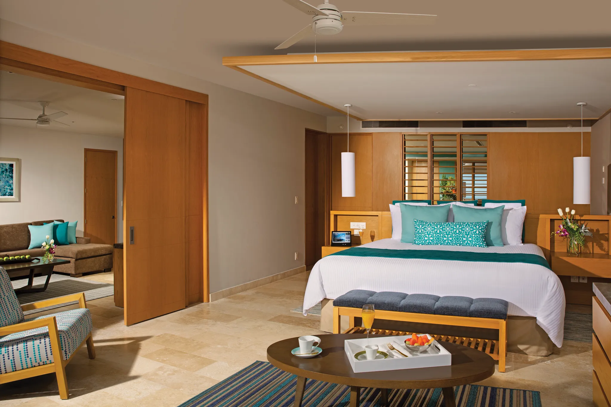Bedroom with king bed in Preferred Club Master Suite Ocean View at Dreams Playa Mujeres.