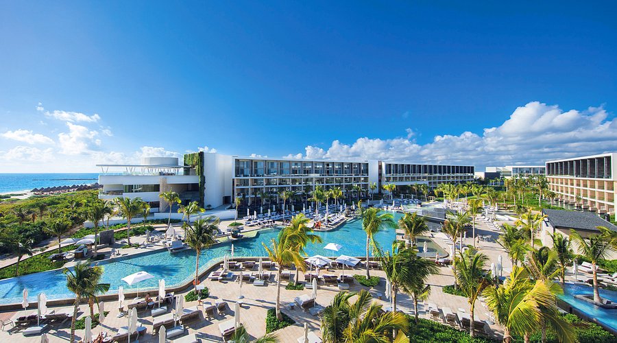 TRS Coral Hotel adults-only luxury beachfront resort with modern suites and infinity pools in Costa Mujeres.